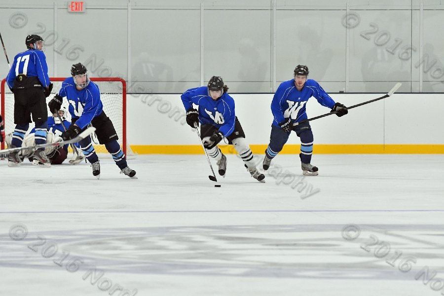 Wheaton College Men\'s Ice Hockey vs Middlesex Community College. - Photo By: KEITH NORDSTROM